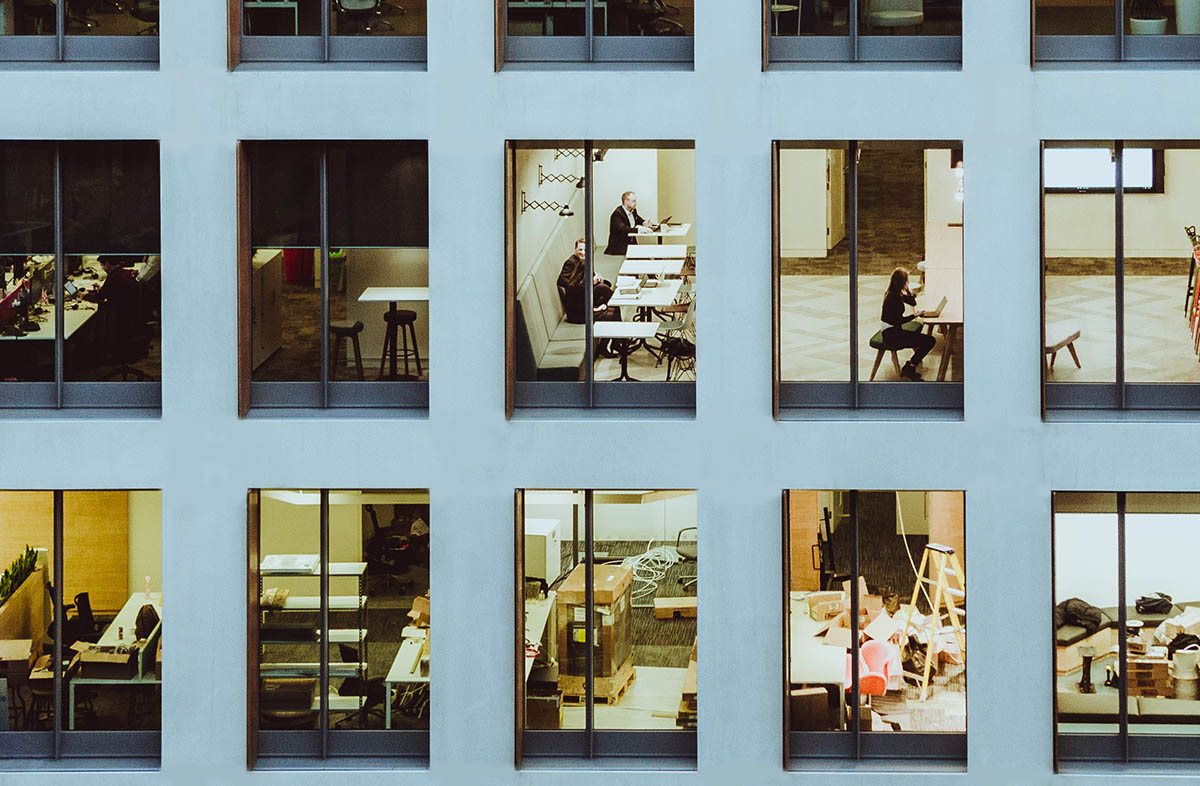 The view into an office building with multiple windows